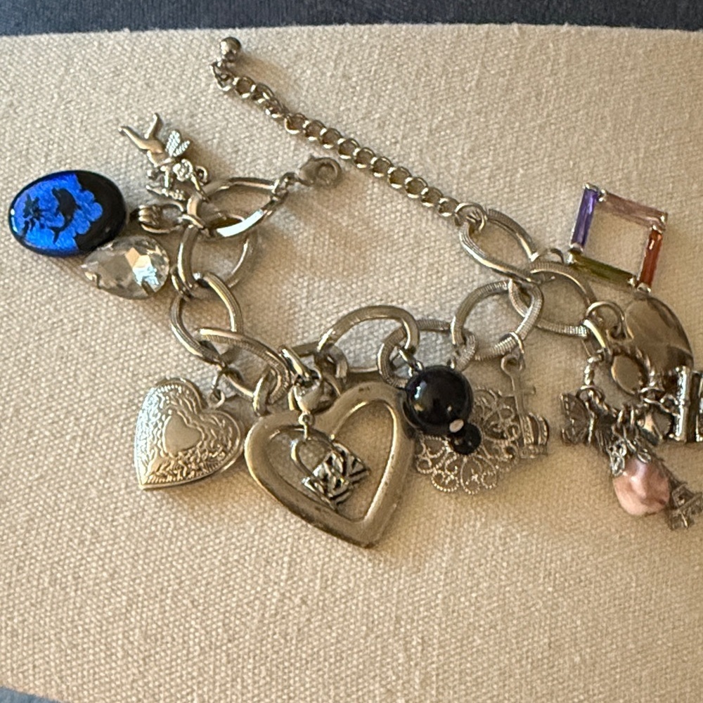 Silver-tone Adjustable Charm Bracelet with 12 charms. - Picture 1 of 8